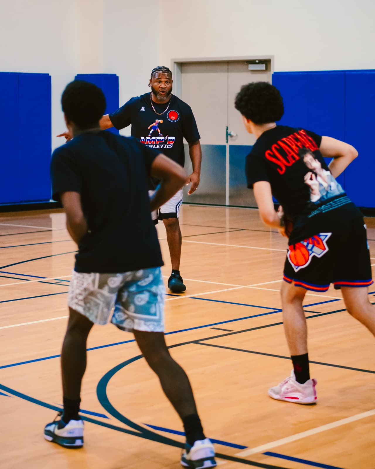 Pro trainer coaching a player at the Hanging with the Pros event